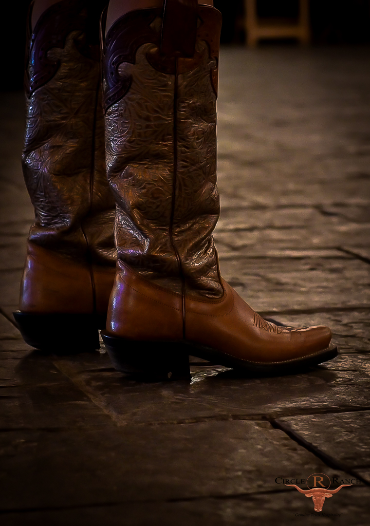Tooled leather cowboy boots on the dance floor